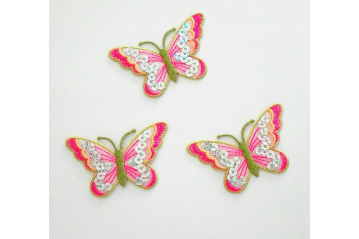 Disegni Termoadesivi - Farfalle Fuxia con Paillettes Argento Disegni Termoadesivi - Farfalle Fuxia con Paillettes Argento