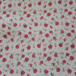 Tejido Patchwork con Flor Rosa