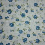 Tejido Patchwork con Flor Azul